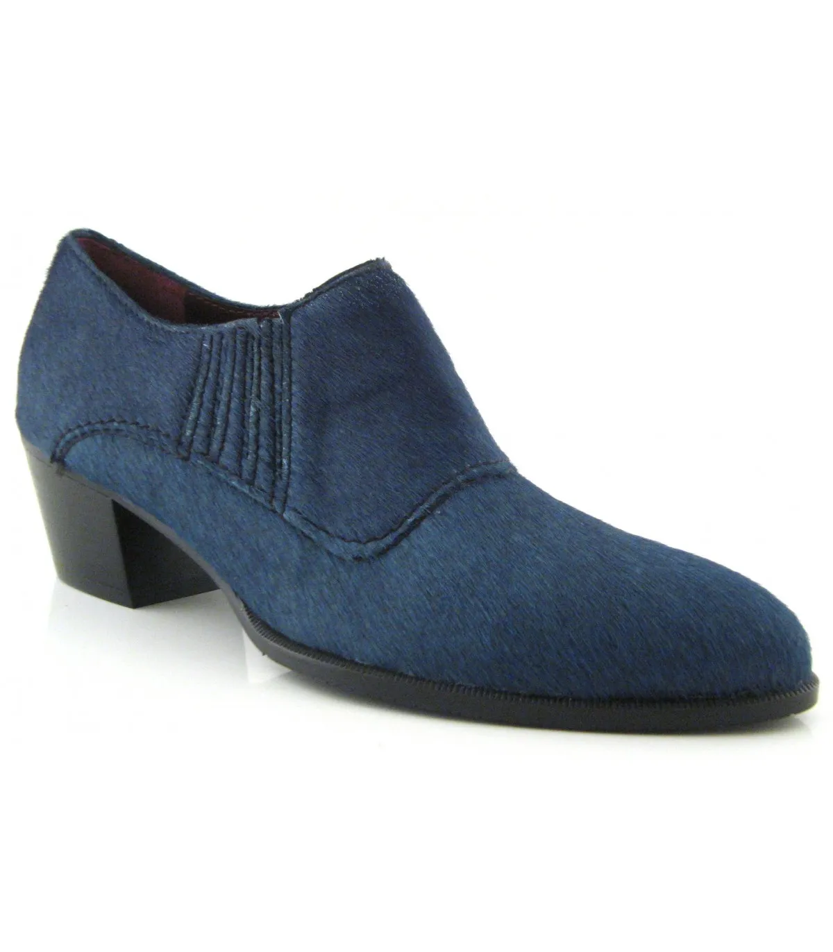 Zapato color petróleo con pelo de potro